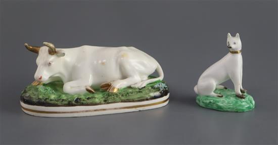 A Davenport porcelain figure of a recumbent cow, c.1830-50, L. 13.2cm and 6.5cm (2)